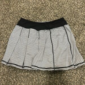 XS black and white striped athletic skirt.